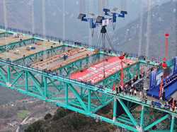 Focus China completes main structure of worlds tallest bridge